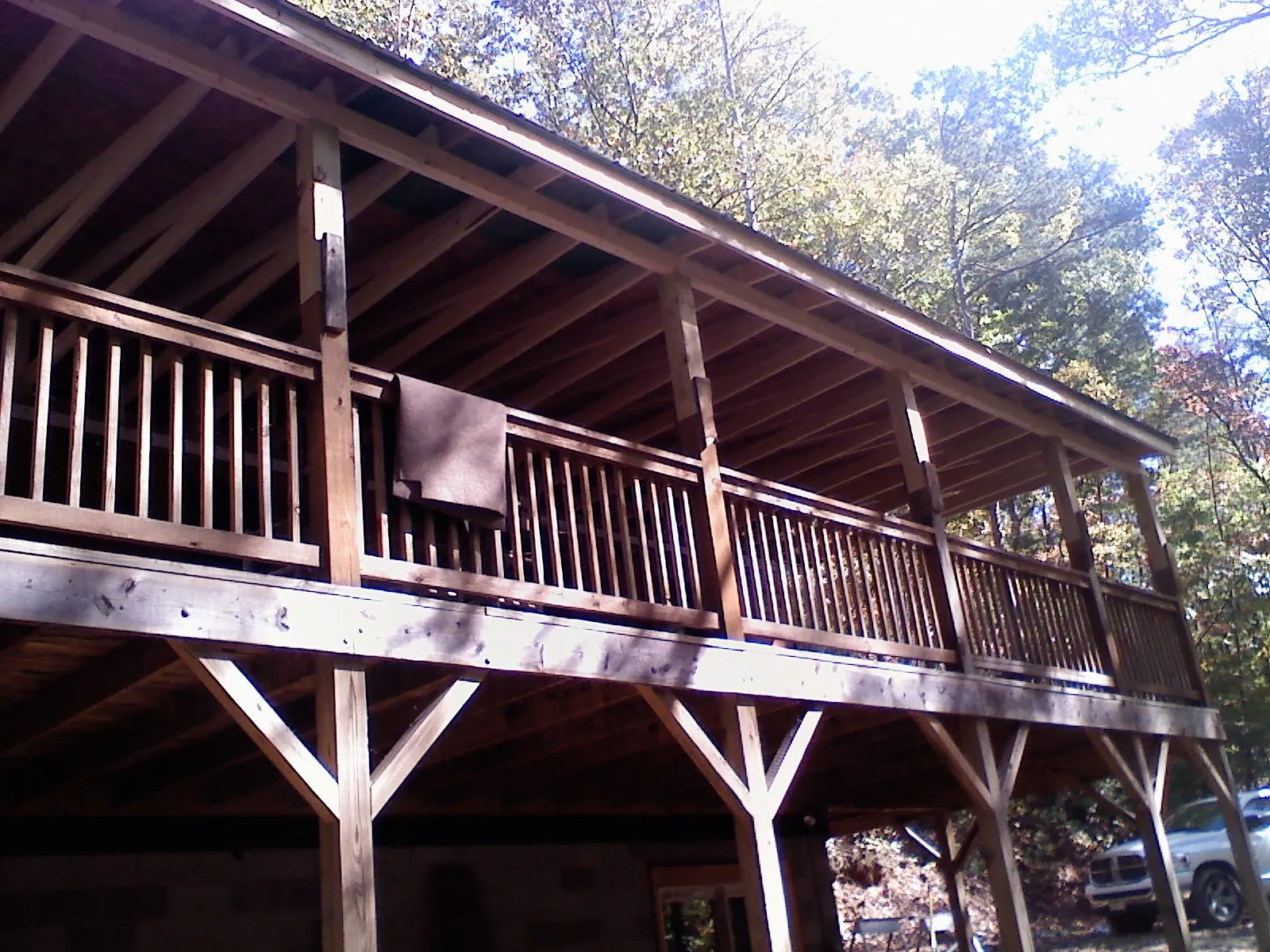 Timber framing under a new elevated porch and deck — Roof Leak Repair in Selkirk by Roofing Brothers